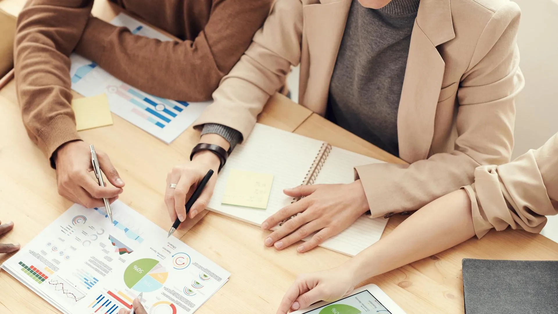 Professionals collaborating in a business meeting representing B2B website design strategy